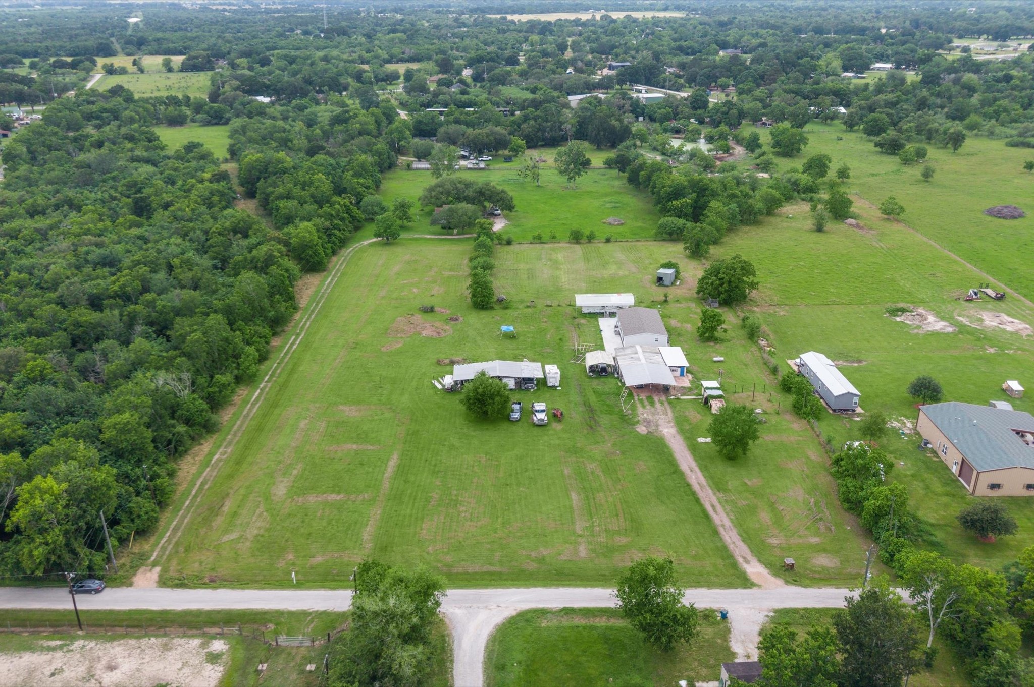 1529 Manak Road Sealy, TX 77474 - Photo 11 of 11 an aerial view of a pool