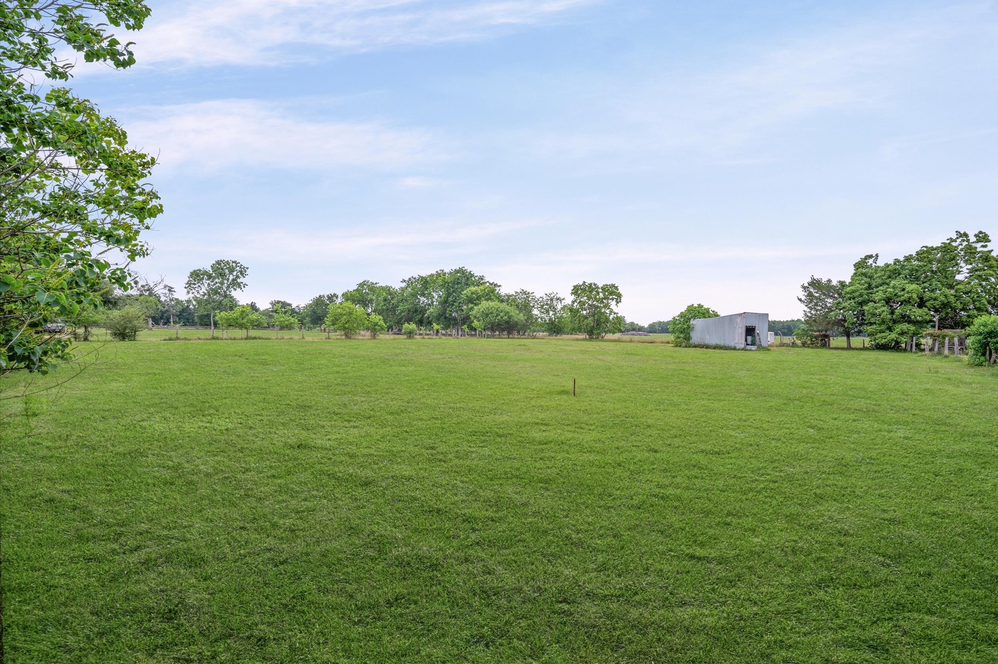 1529 Manak Road Sealy, TX 77474 - Photo 2 of 11 a view of a green field with clear sky