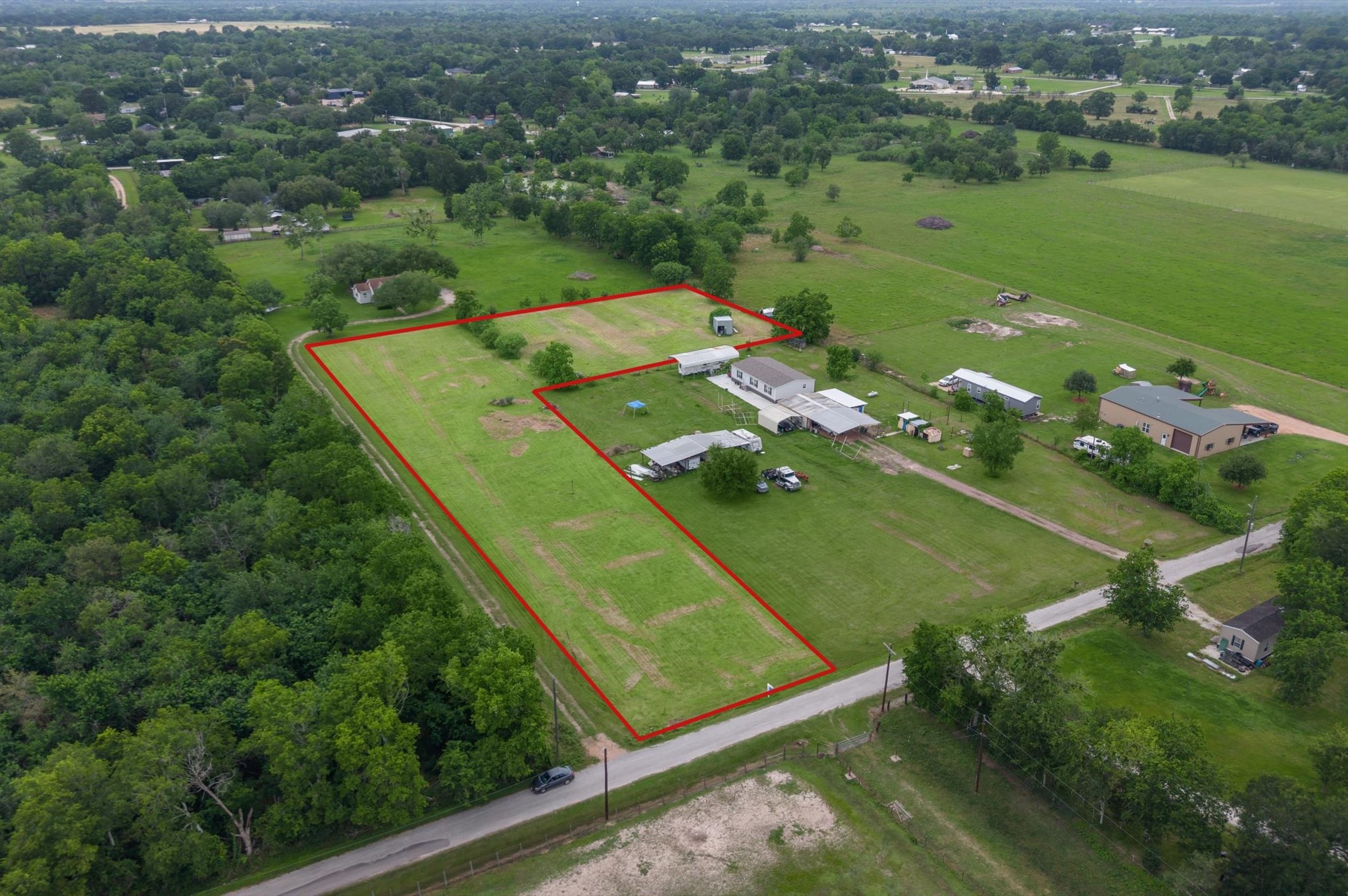 1529 Manak Road Sealy, TX 77474 - Photo 6 of 11 an aerial view of a golf course with chairs