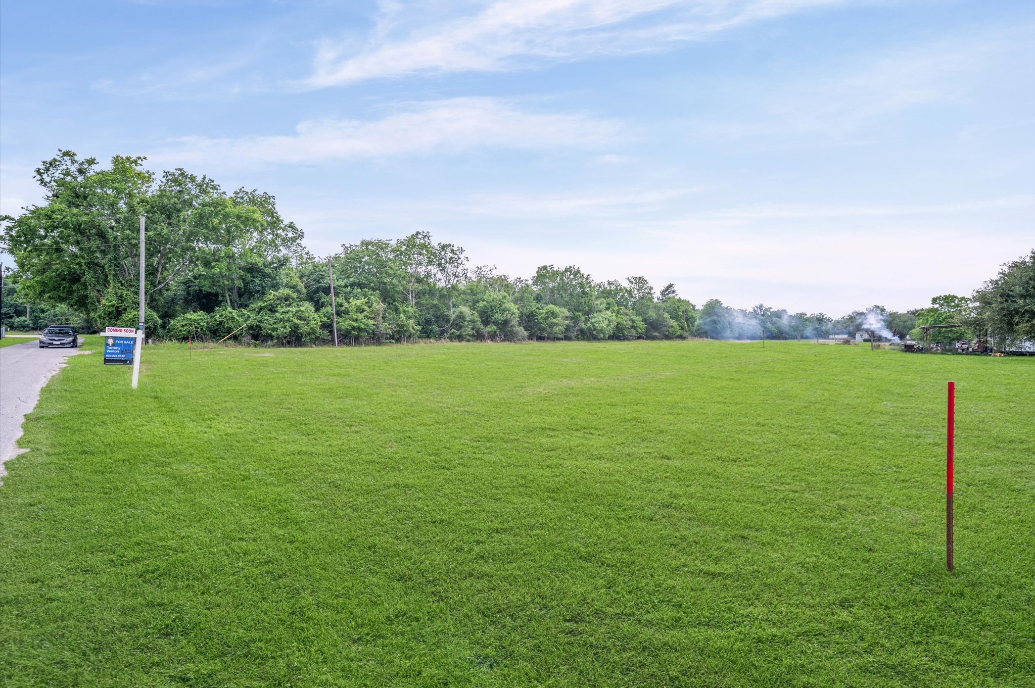 1529 Manak Road Sealy, TX 77474 - Photo 7 of 11 a view of outdoor space with deck and yard