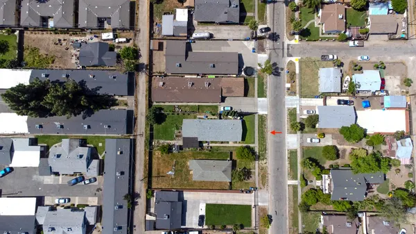 an aerial view of houses with outdoor space