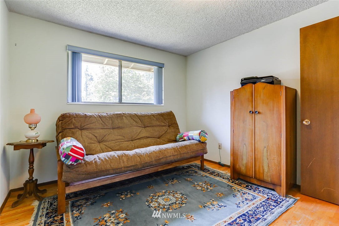 4518 Southeast 2nd Street Renton, WA 98059 - Photo 18 of 29 a living room with furniture and a gate