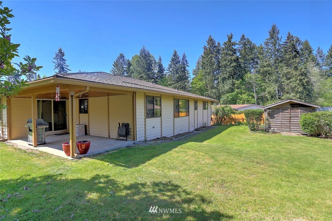 4518 Southeast 2nd Street Renton, WA 98059 - Photo 28 of 29 a view of a house with backyard porch and sitting area