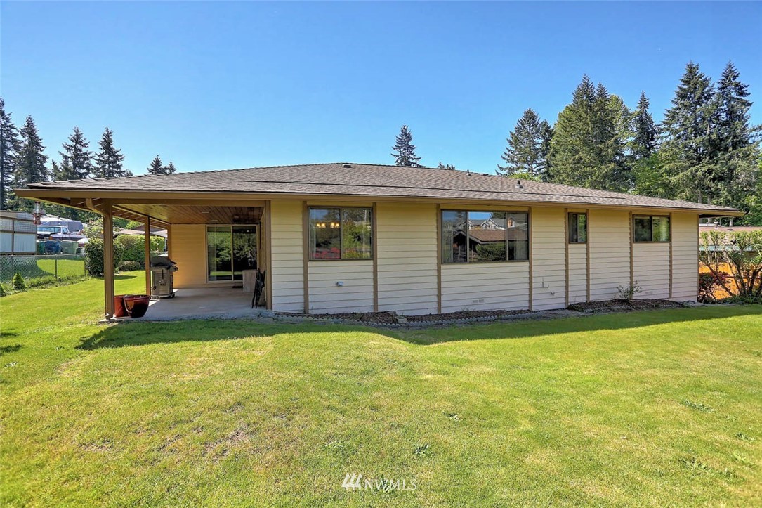4518 Southeast 2nd Street Renton, WA 98059 - Photo 29 of 29 a view of a house with backyard and porch