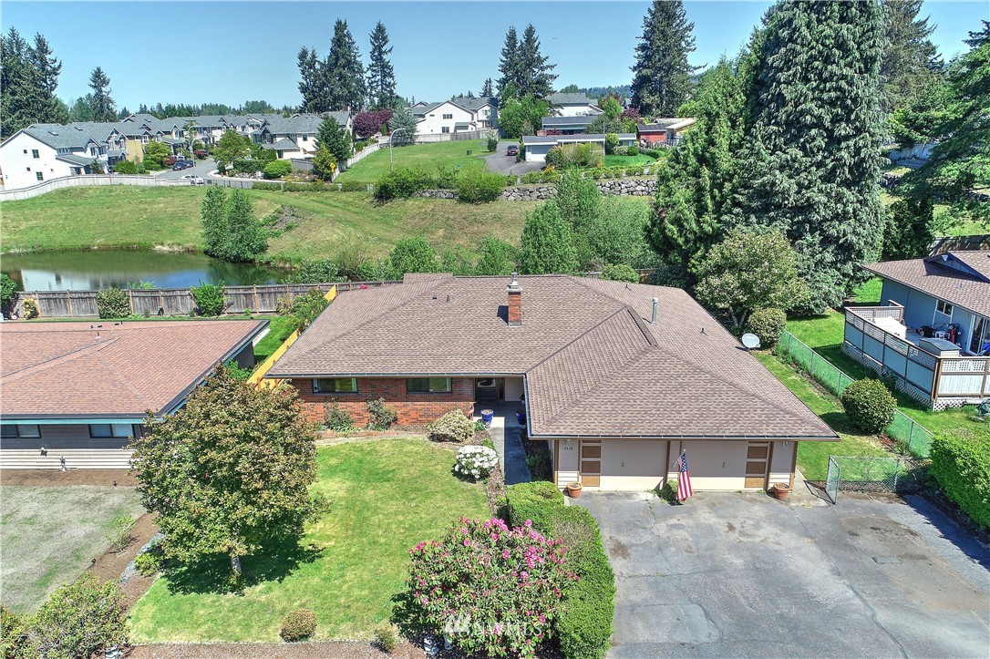4518 Southeast 2nd Street Renton, WA 98059 - Photo 4 of 29 an aerial view of a house with a garden