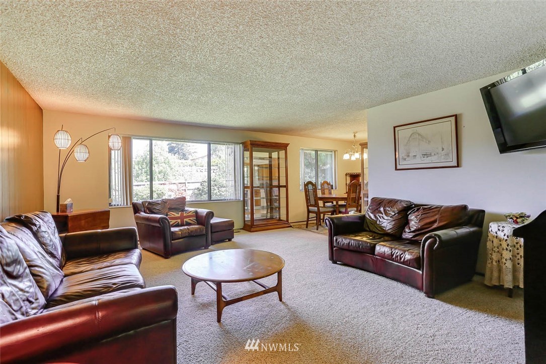 4518 Southeast 2nd Street Renton, WA 98059 - Photo 7 of 29 a living room with furniture and a large window