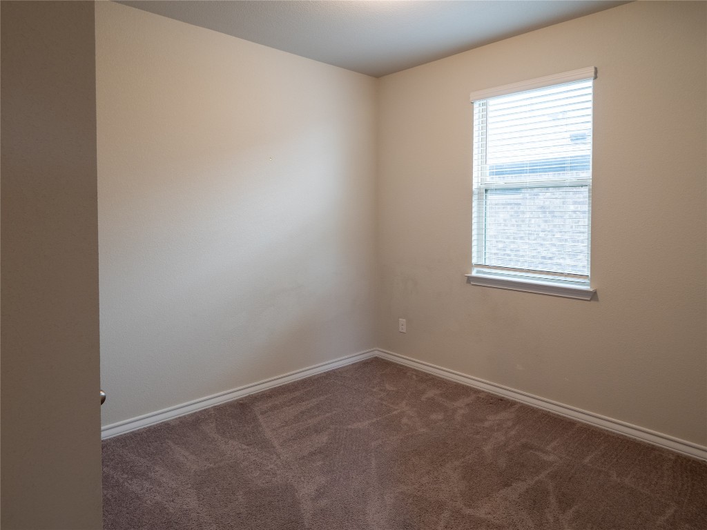 1320 Eagle Ray Street Leander, TX 78641 - Photo 12 of 30 an empty room with a window