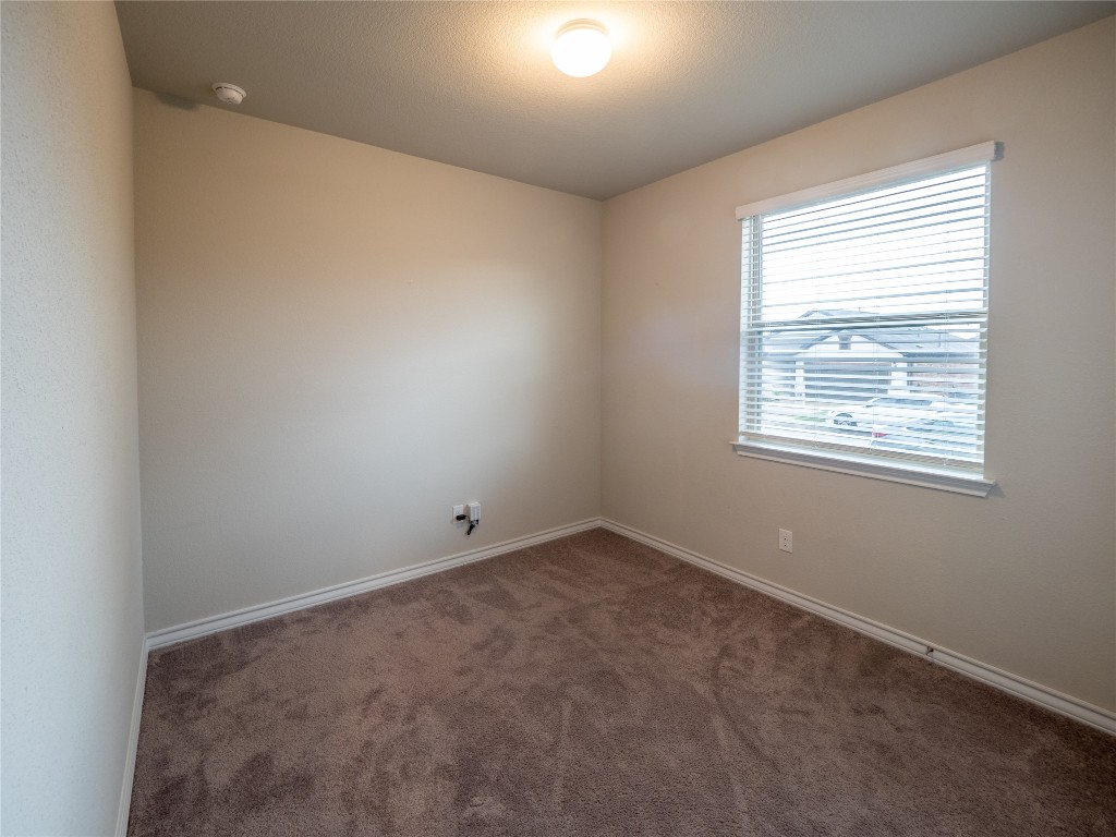 1320 Eagle Ray Street Leander, TX 78641 - Photo 16 of 30 an empty room with windows