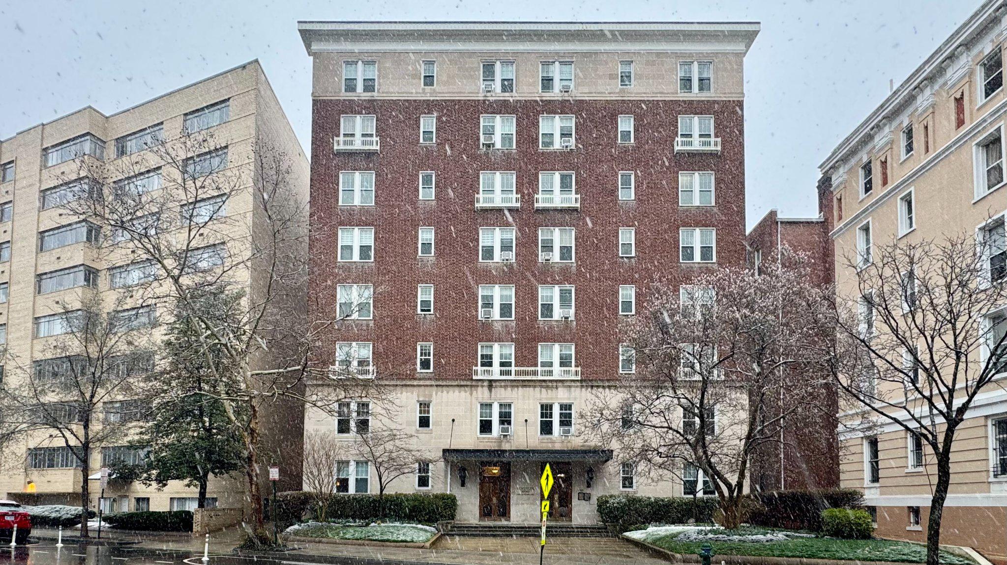 a view of a building with a street