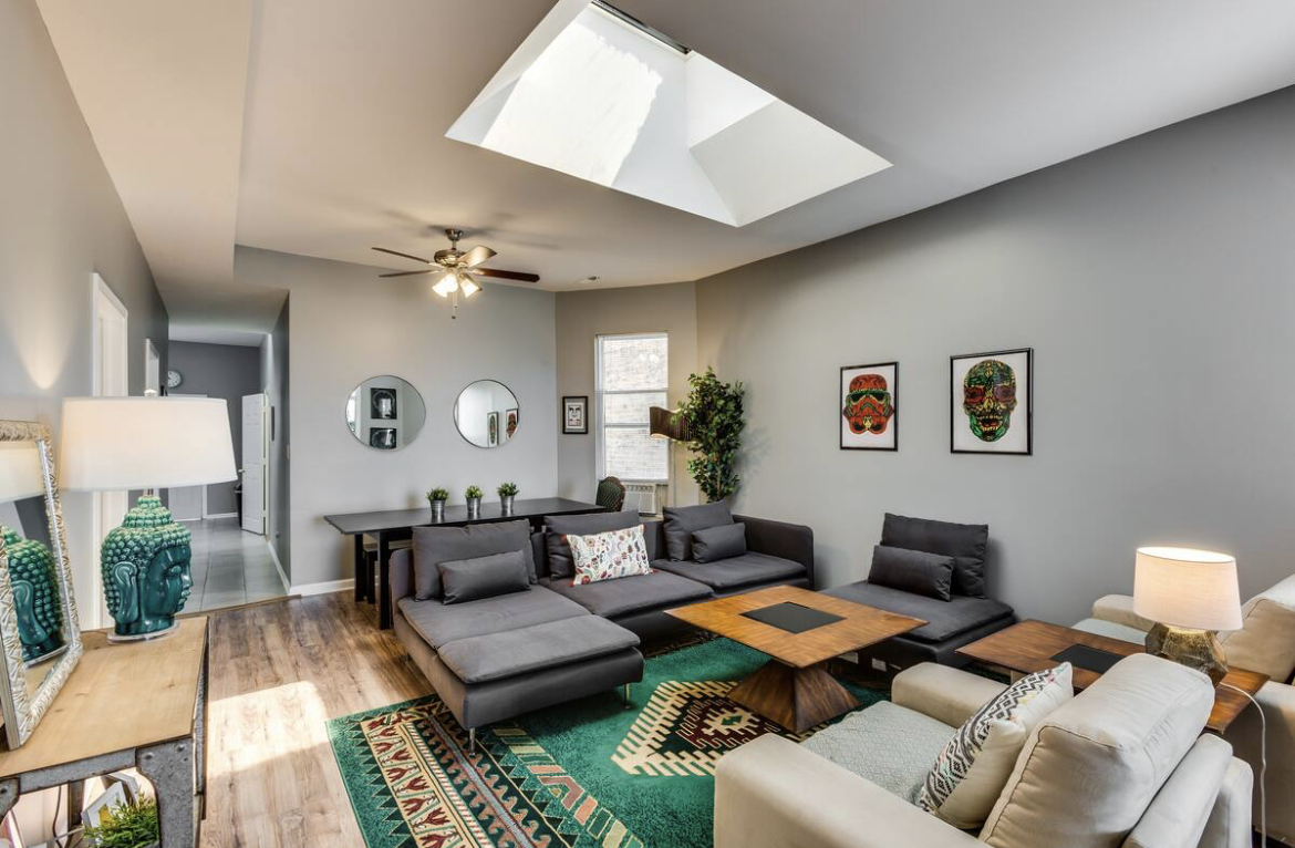 3140 West Fulton Street Chicago, IL 60612 - Photo 4 of 23 a living room with furniture and a table