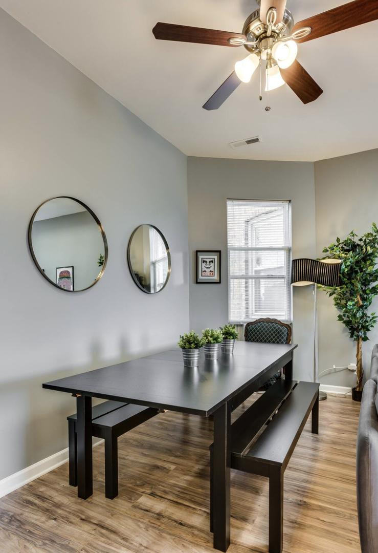 3140 West Fulton Street Chicago, IL 60612 - Photo 5 of 23 a view of a room with furniture and wooden floor