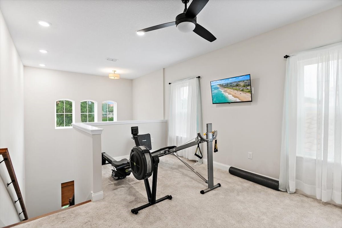 96014 Enclave Manor Fernandina Beach, FL 32034 - Photo 18 of 32 a view of a workspace with furniture and windows