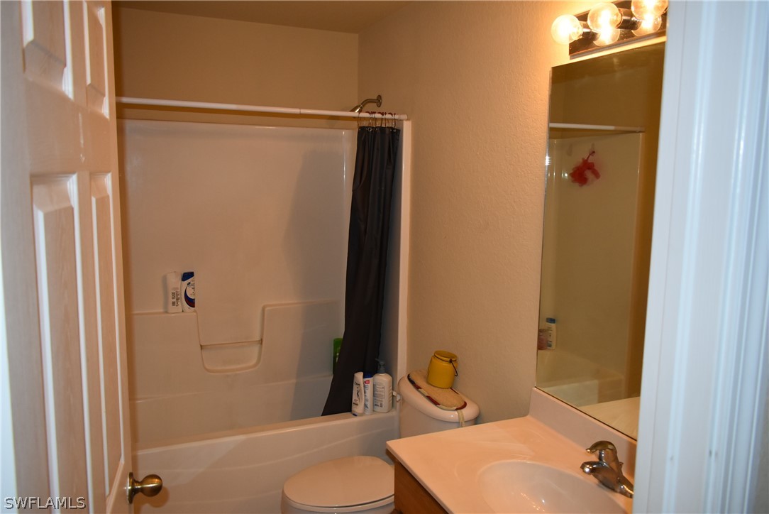 5264 Glenlivet Road Fort Myers, FL 33907 - Photo 15 of 15 a bathroom with a shower and a toilet
