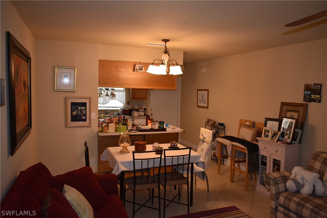 5264 Glenlivet Road Fort Myers, FL 33907 - Photo 4 of 15 a dining room with furniture and window