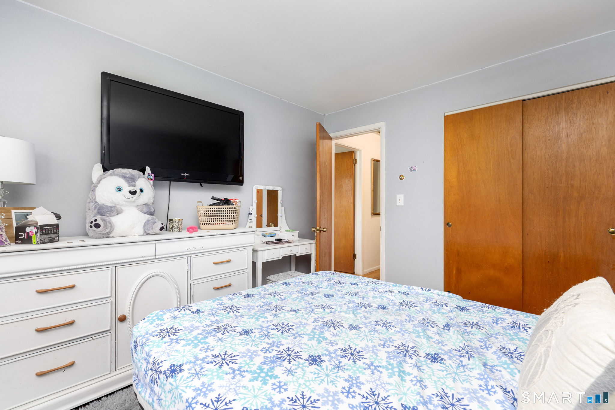 325 Barbara Road Middletown, CT 06457 - Photo 28 of 40 a bedroom with a bed and a flat screen tv