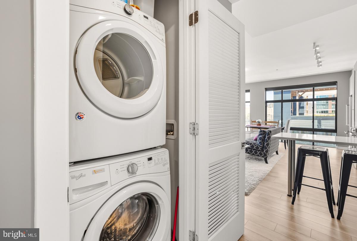 911 2nd Street Northeast, Unit 501 Washington, DC 20002 - Photo 20 of 30 a view of a hallway with washer and dryer
