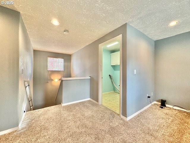 37355 Coralburst Street Sandy, OR 97055 - Photo 27 of 30 a view of a big room with a chandelier and a bathroom