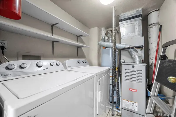 a view of an empty room and closet area
