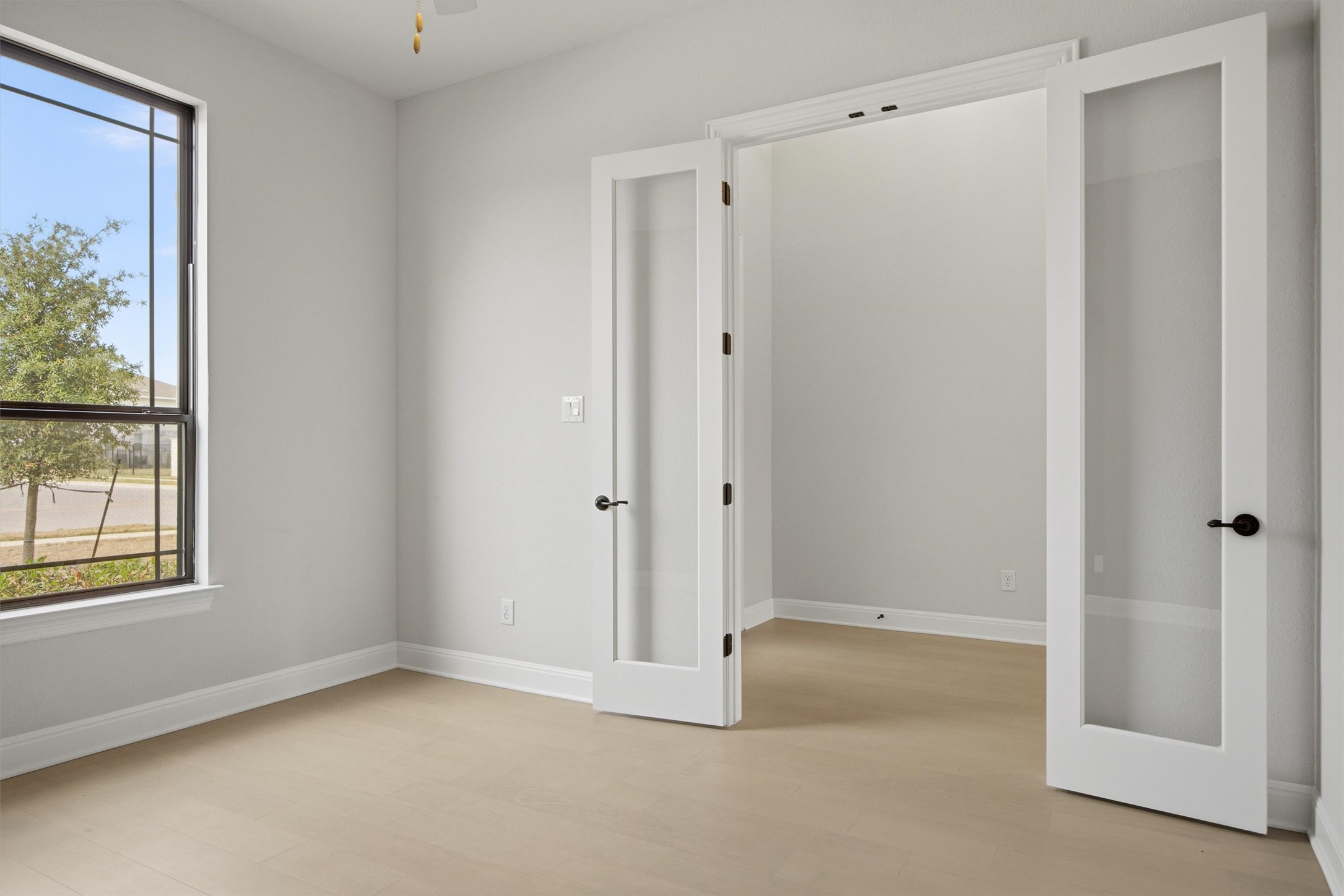 208 Tovas Secret Cove Georgetown, TX 78628 - Photo 7 of 40 a view of an empty room with a window