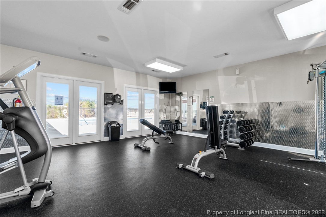 162 Old Montague Way Cameron, NC 28326 - Photo 12 of 16 a view of a room with gym equipment