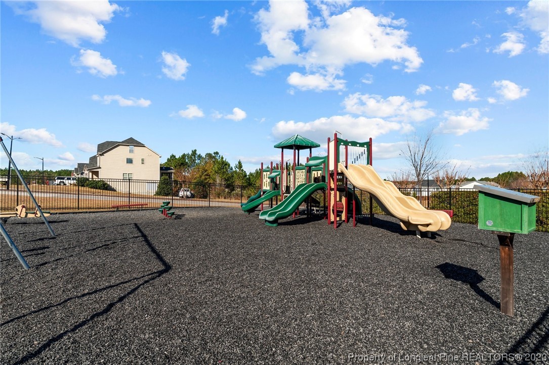 162 Old Montague Way Cameron, NC 28326 - Photo 15 of 16 a park view with a slide