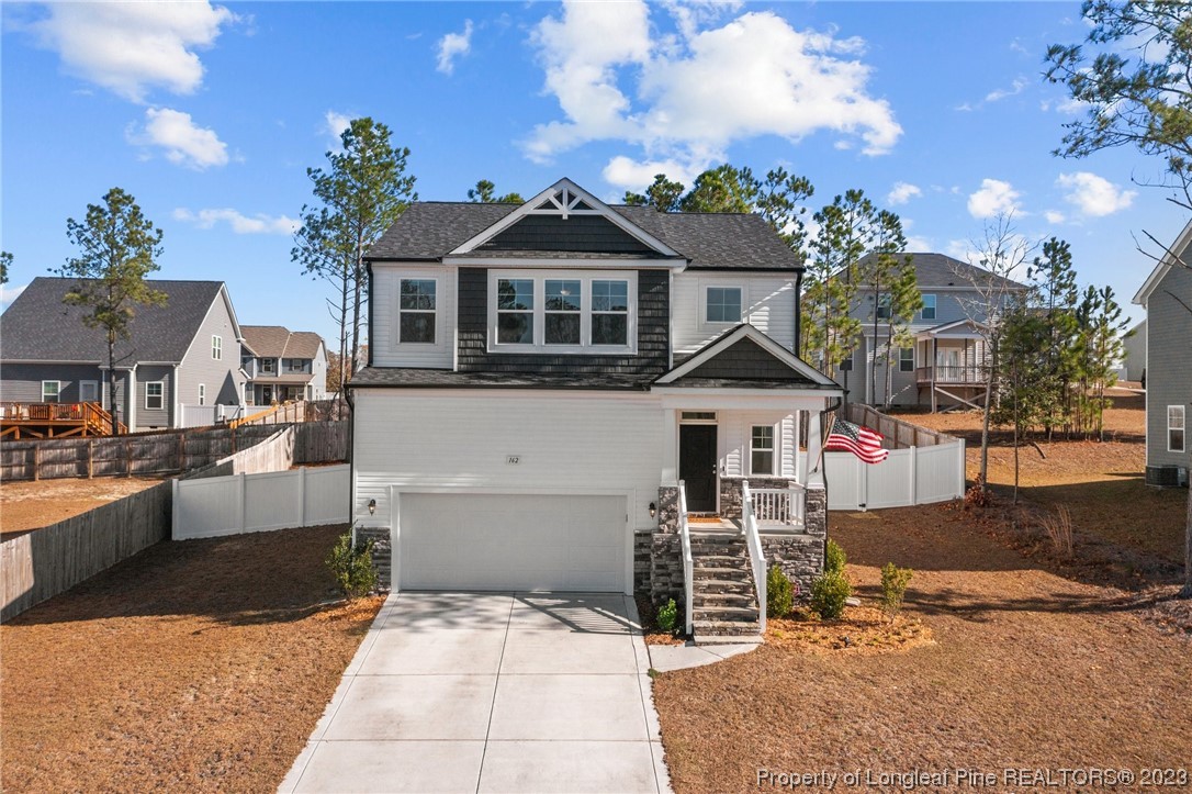 162 Old Montague Way Cameron, NC 28326 - Photo 2 of 16 a front view of house with yard