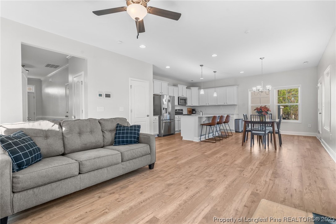 162 Old Montague Way Cameron, NC 28326 - Photo 4 of 16 a living room with furniture and a table
