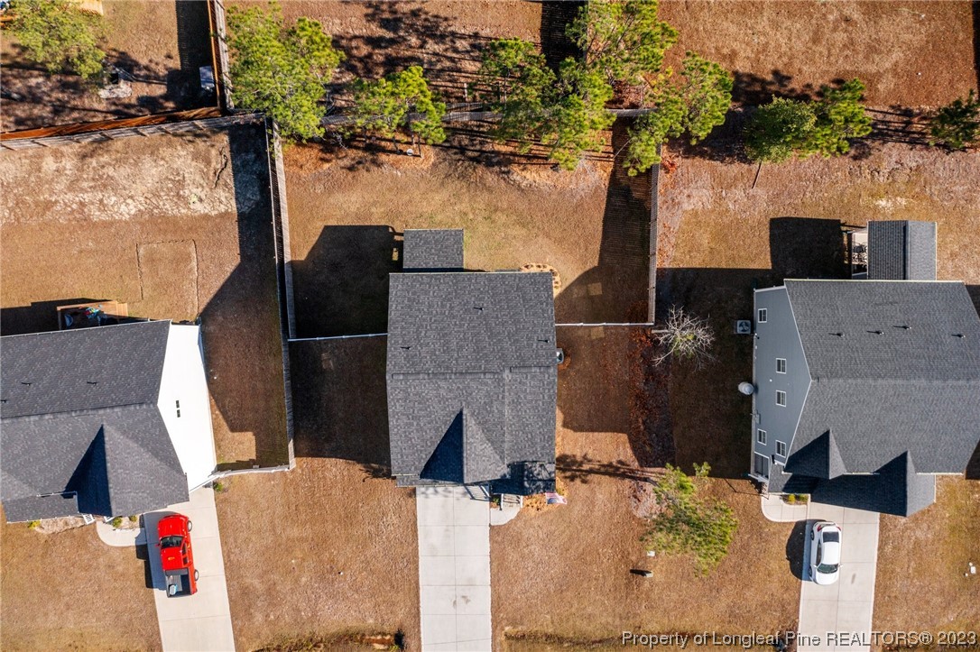 162 Old Montague Way Cameron, NC 28326 - Photo 8 of 16 an aerial view of houses with yard