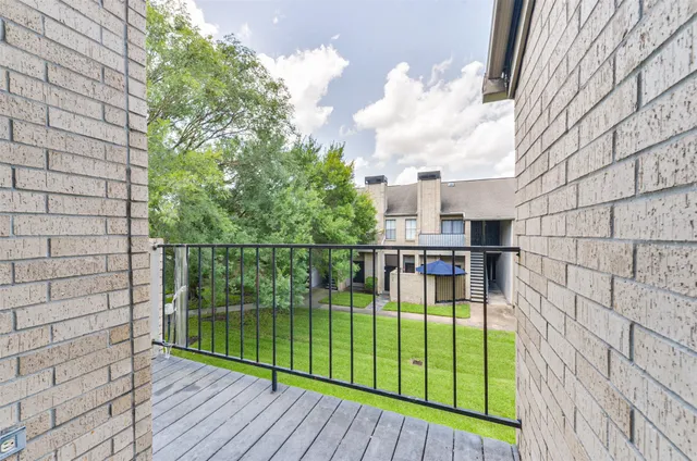 a view of an outdoor kitchen and outdoor space