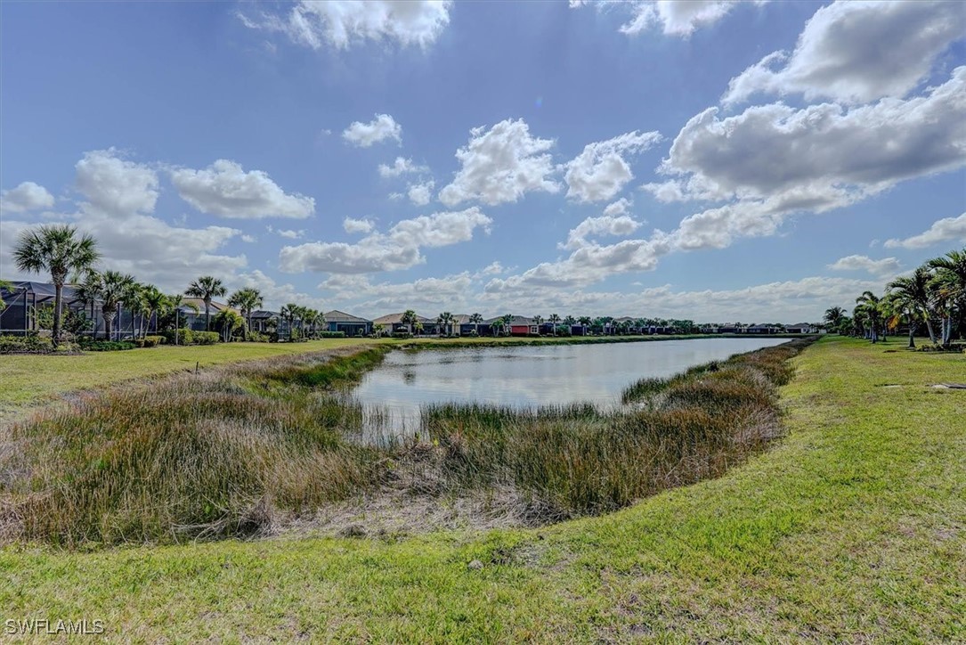 10655 Prato Drive Fort Myers, FL 33913 - Photo 46 of 49 a view of a lake from a yard