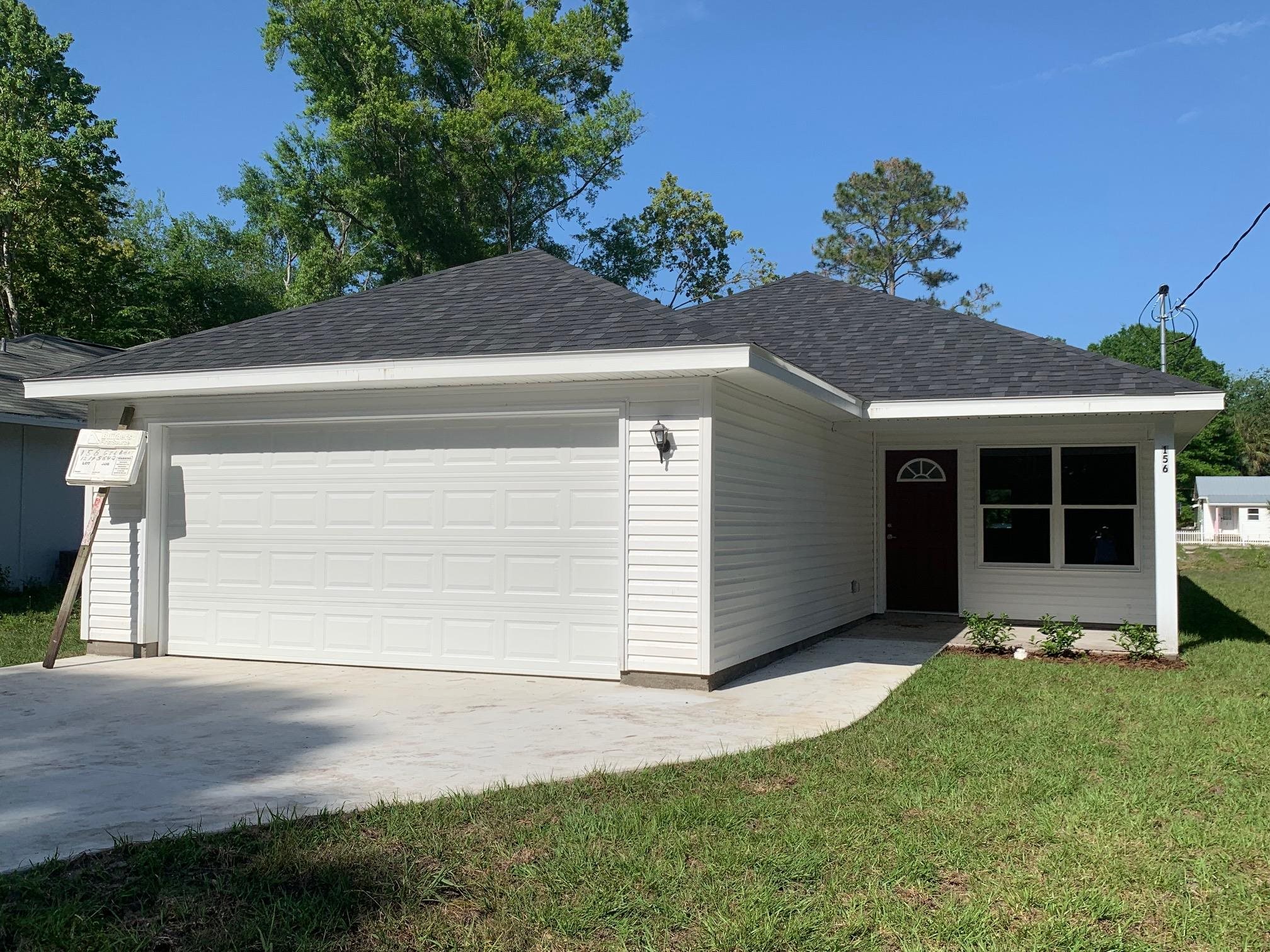 156 Gilbert Street St. Augustine, FL 32084 - Photo 1 of 35 a view of a house with a garden