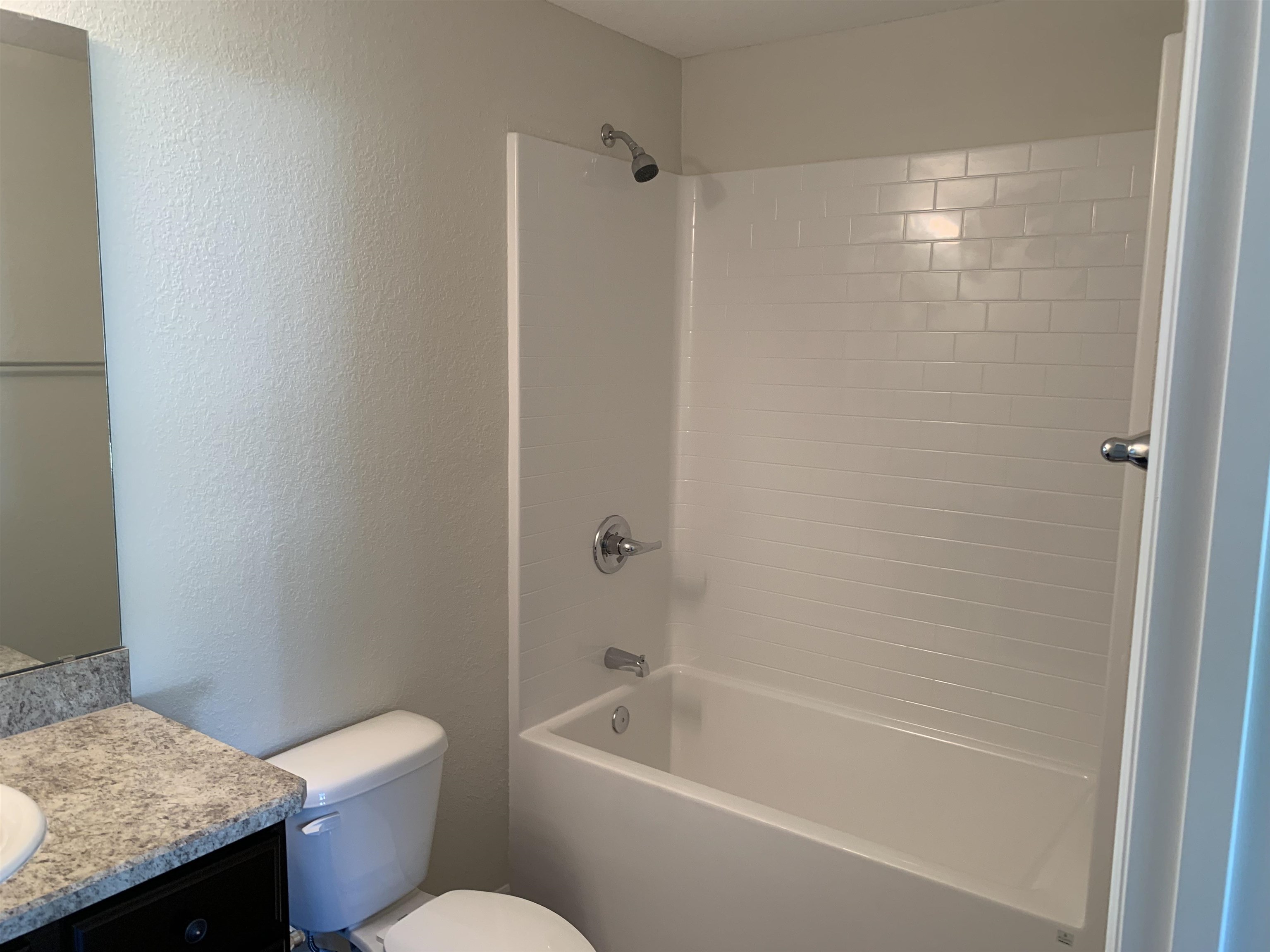 156 Gilbert Street St. Augustine, FL 32084 - Photo 20 of 35 a bathroom with a sink a toilet and shower