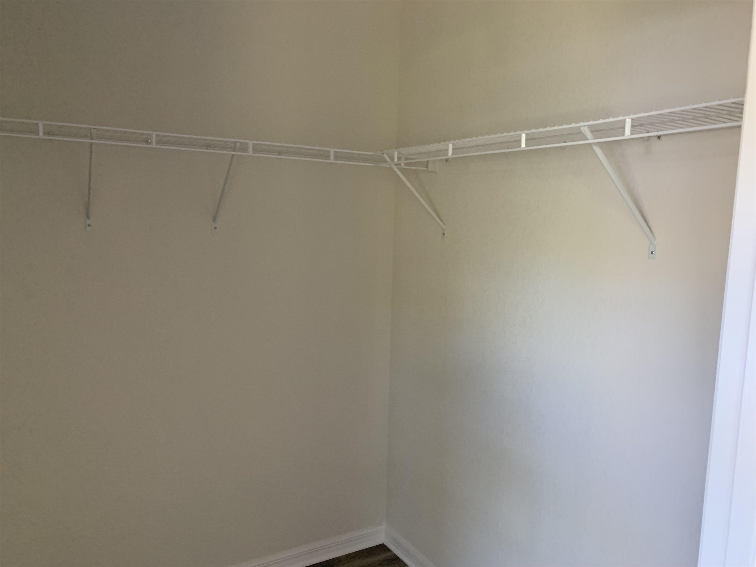 156 Gilbert Street St. Augustine, FL 32084 - Photo 22 of 35 a view of a room with racks on the wall