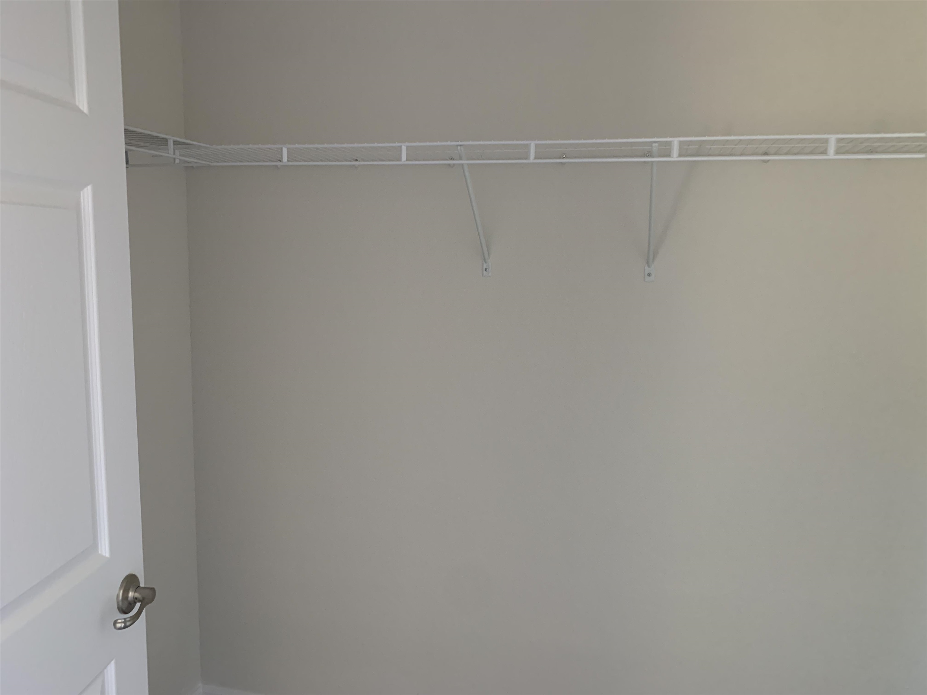 156 Gilbert Street St. Augustine, FL 32084 - Photo 23 of 35 a view of a room with racks on the wall