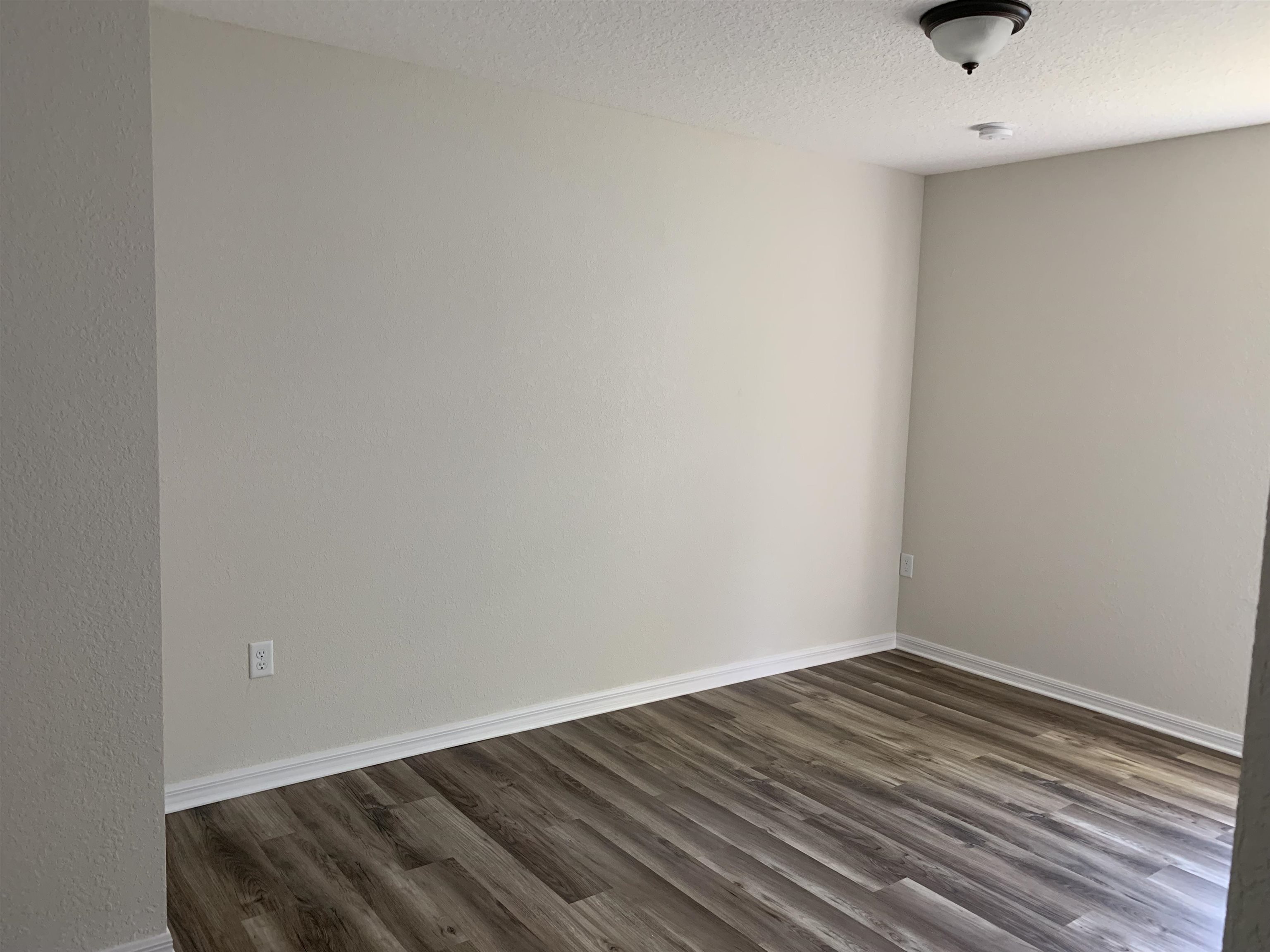 156 Gilbert Street St. Augustine, FL 32084 - Photo 30 of 35 a view of small space with wooden floor