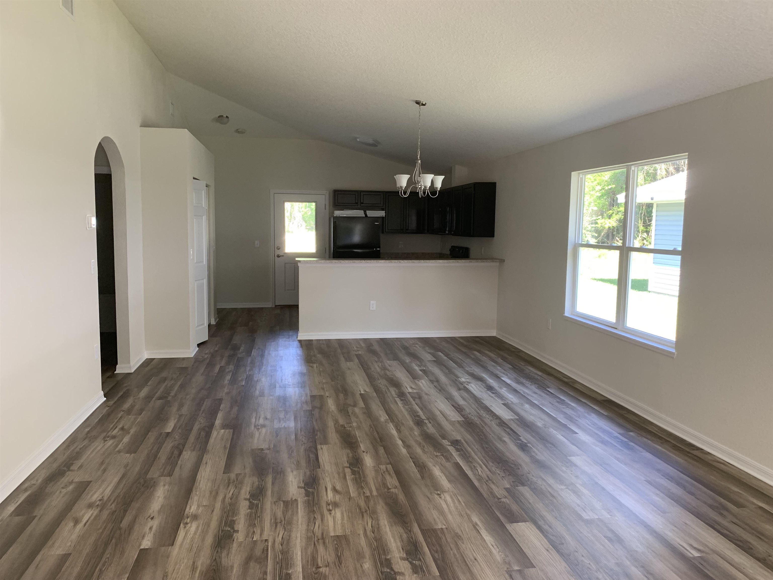 156 Gilbert Street St. Augustine, FL 32084 - Photo 33 of 35 a view of a room with wooden floor