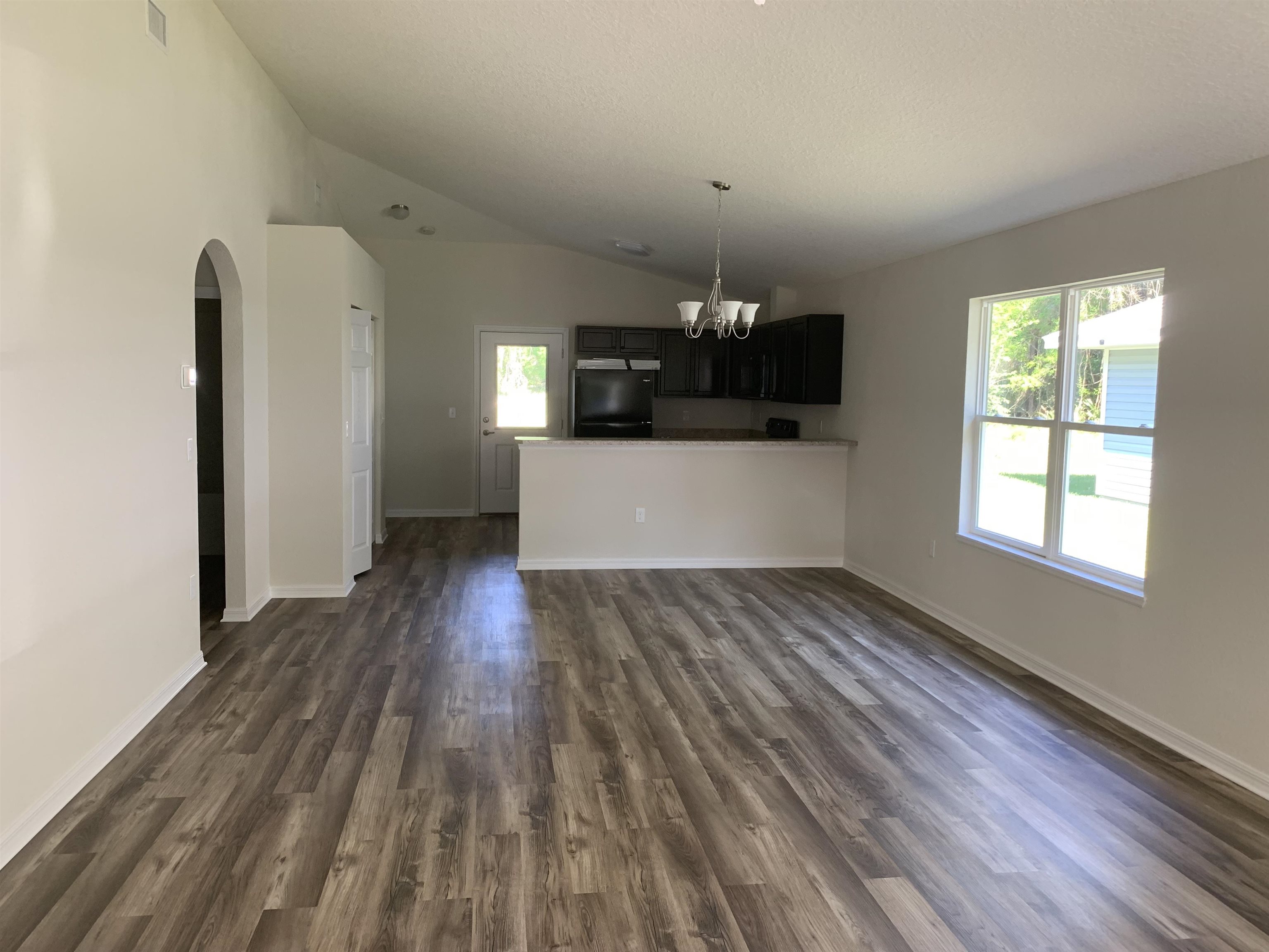 156 Gilbert Street St. Augustine, FL 32084 - Photo 34 of 35 a view of empty room with wooden floor
