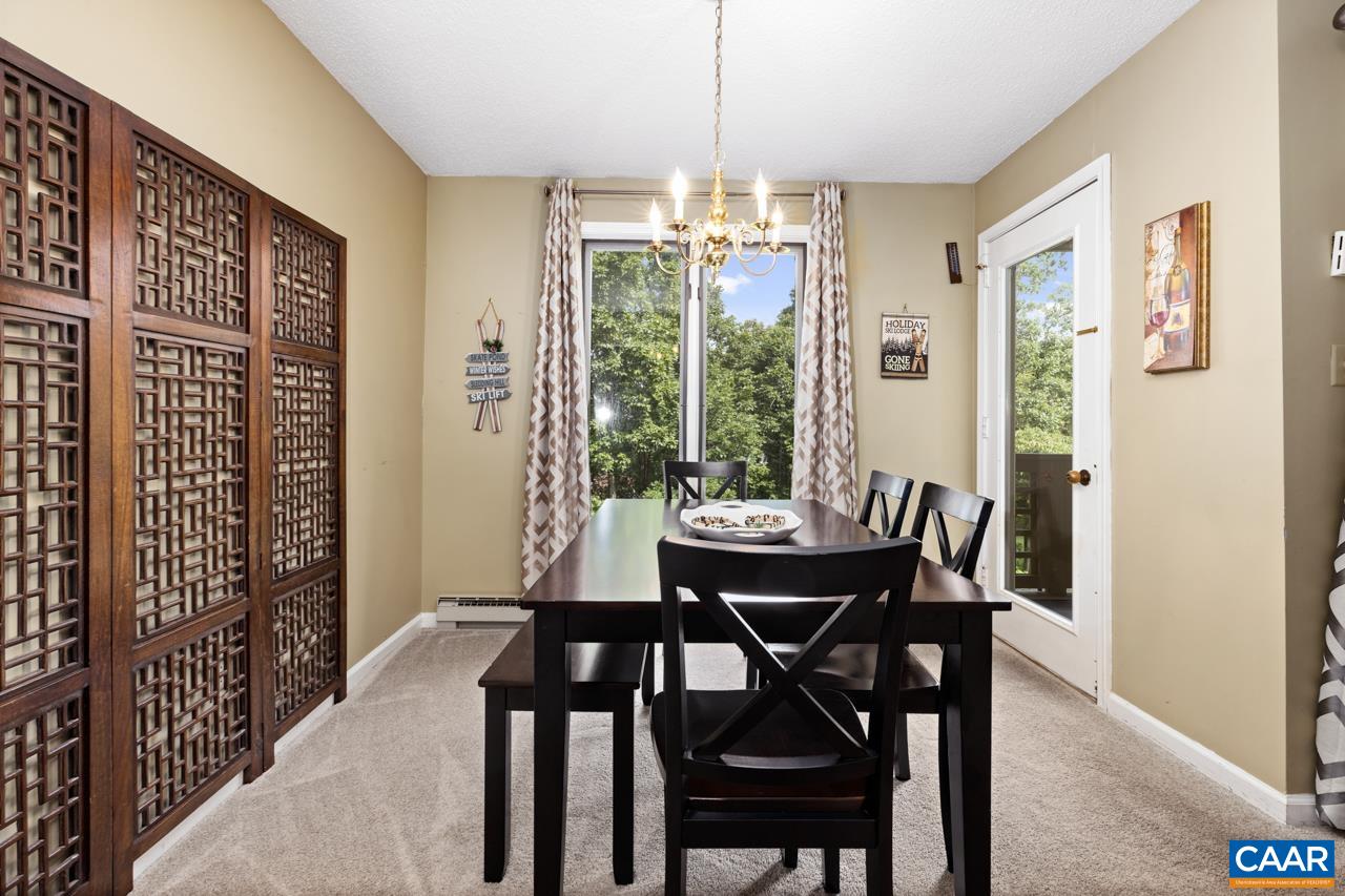 2029 Stone Ridge Wintergreen, VA 22967 - Photo 16 of 30 a view of a dining room with furniture window and outside view
