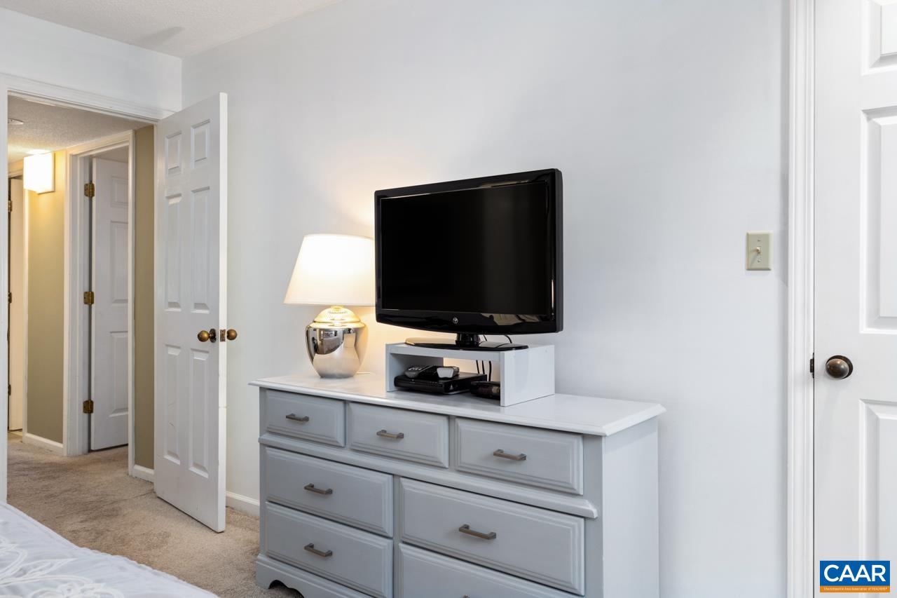 2029 Stone Ridge Wintergreen, VA 22967 - Photo 20 of 30 a living room with flat screen tv and gym equipment