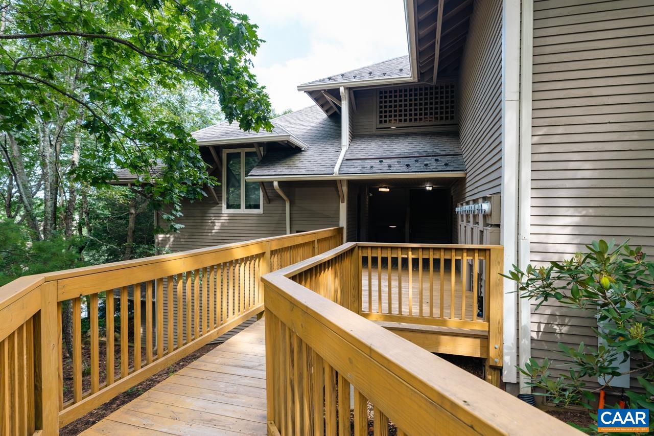 2029 Stone Ridge Wintergreen, VA 22967 - Photo 4 of 30 a balcony with table and chairs