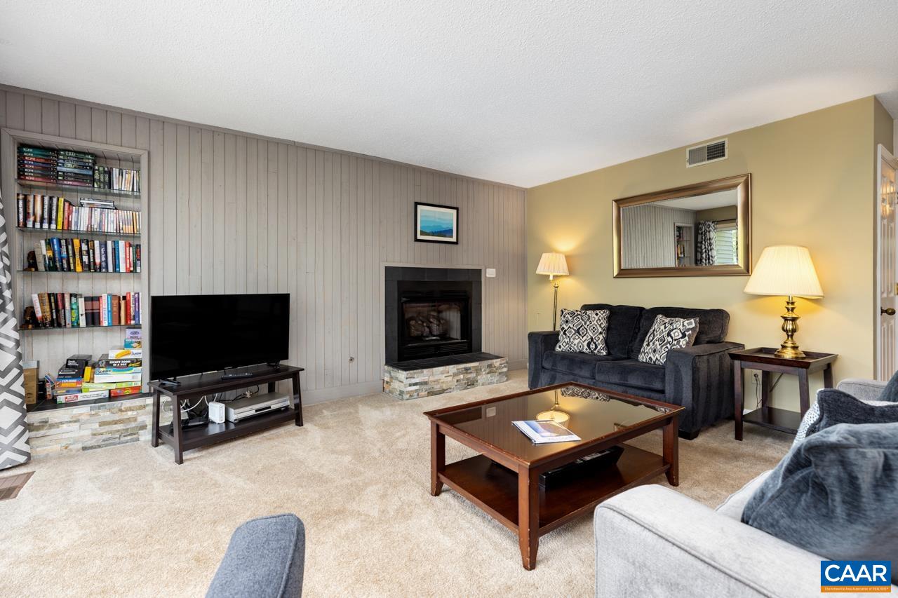 2029 Stone Ridge Wintergreen, VA 22967 - Photo 6 of 30 a living room with furniture and a flat screen tv
