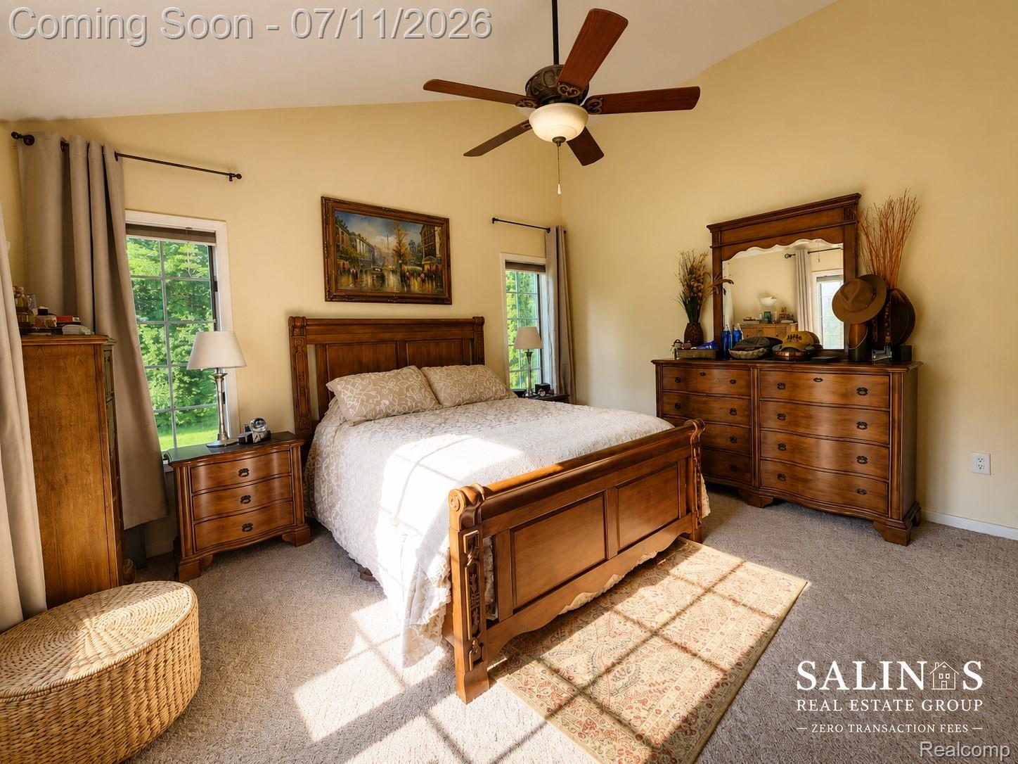 2120 Montague Road Davison, MI 48423 - Photo 21 of 37 Vaulted ceiling room featuring carpet flooring, a ceiling fan with integrated lighting, and dual windows