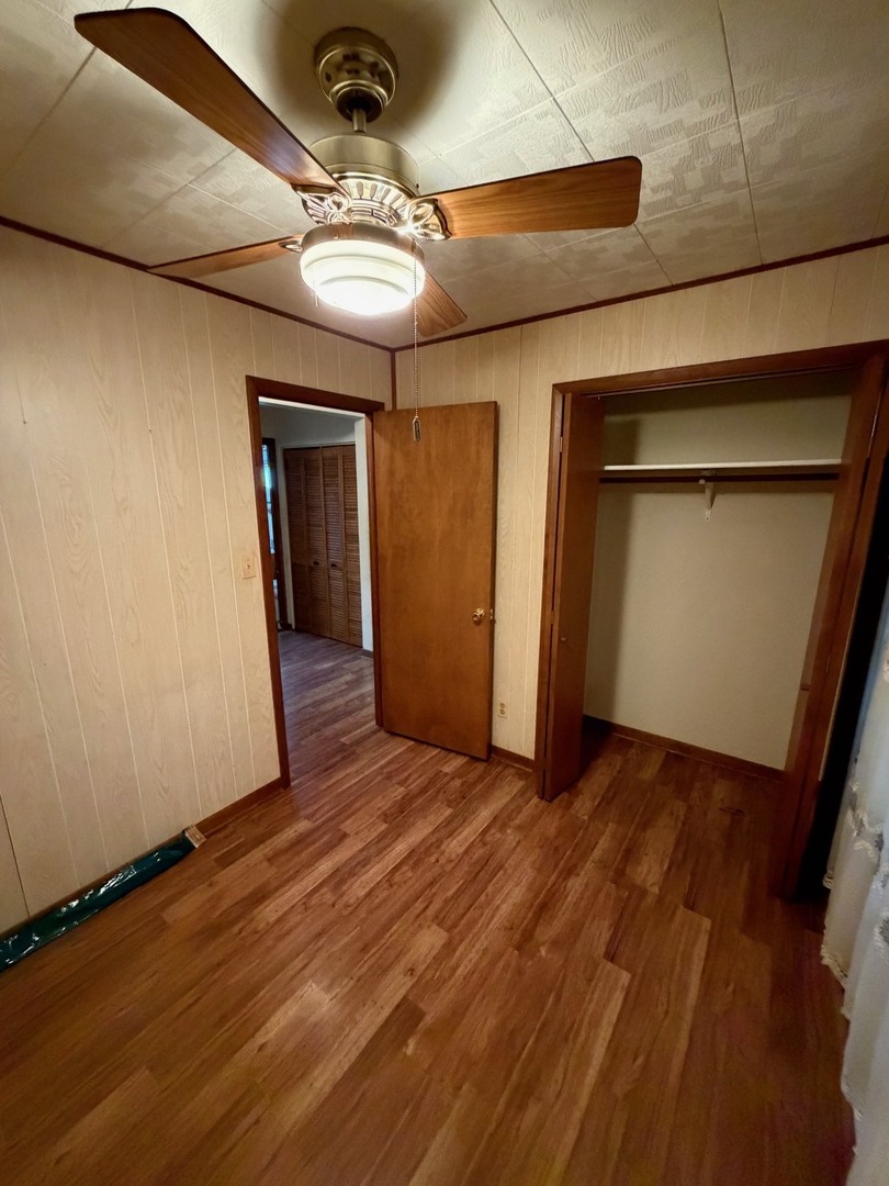 23 West 143rd Street Dixmoor, IL 60426 - Photo 19 of 30 a view of a room with wooden floor