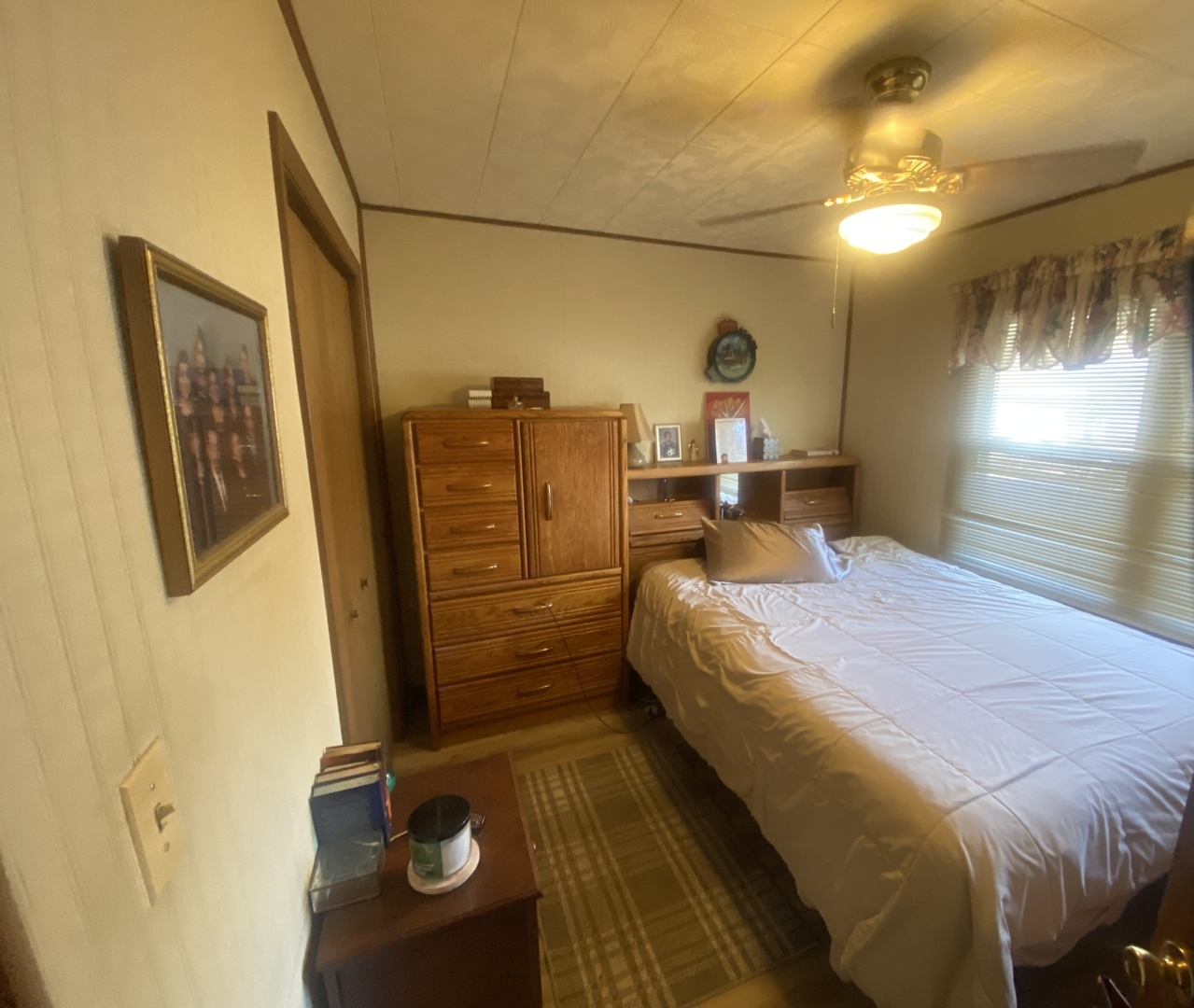 23 West 143rd Street Dixmoor, IL 60426 - Photo 21 of 30 a bed room with a bed and a mirror