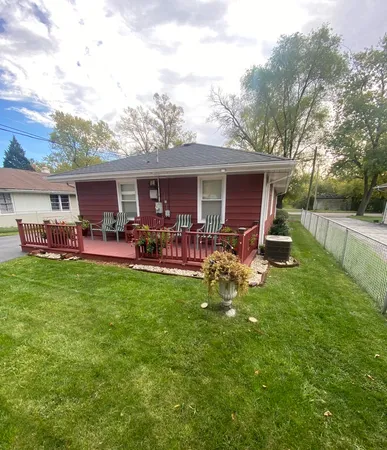 a view of a backyard of the house