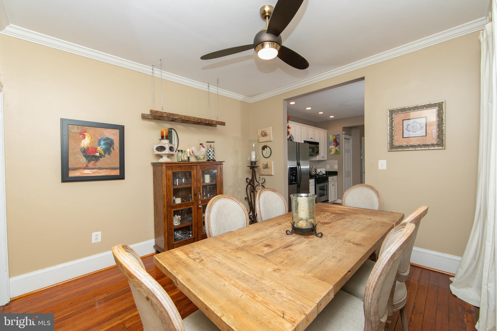 107 Centre Street Haddonfield, NJ 08033 - Photo 15 of 45 a view of a dining room with furniture and wooden floor