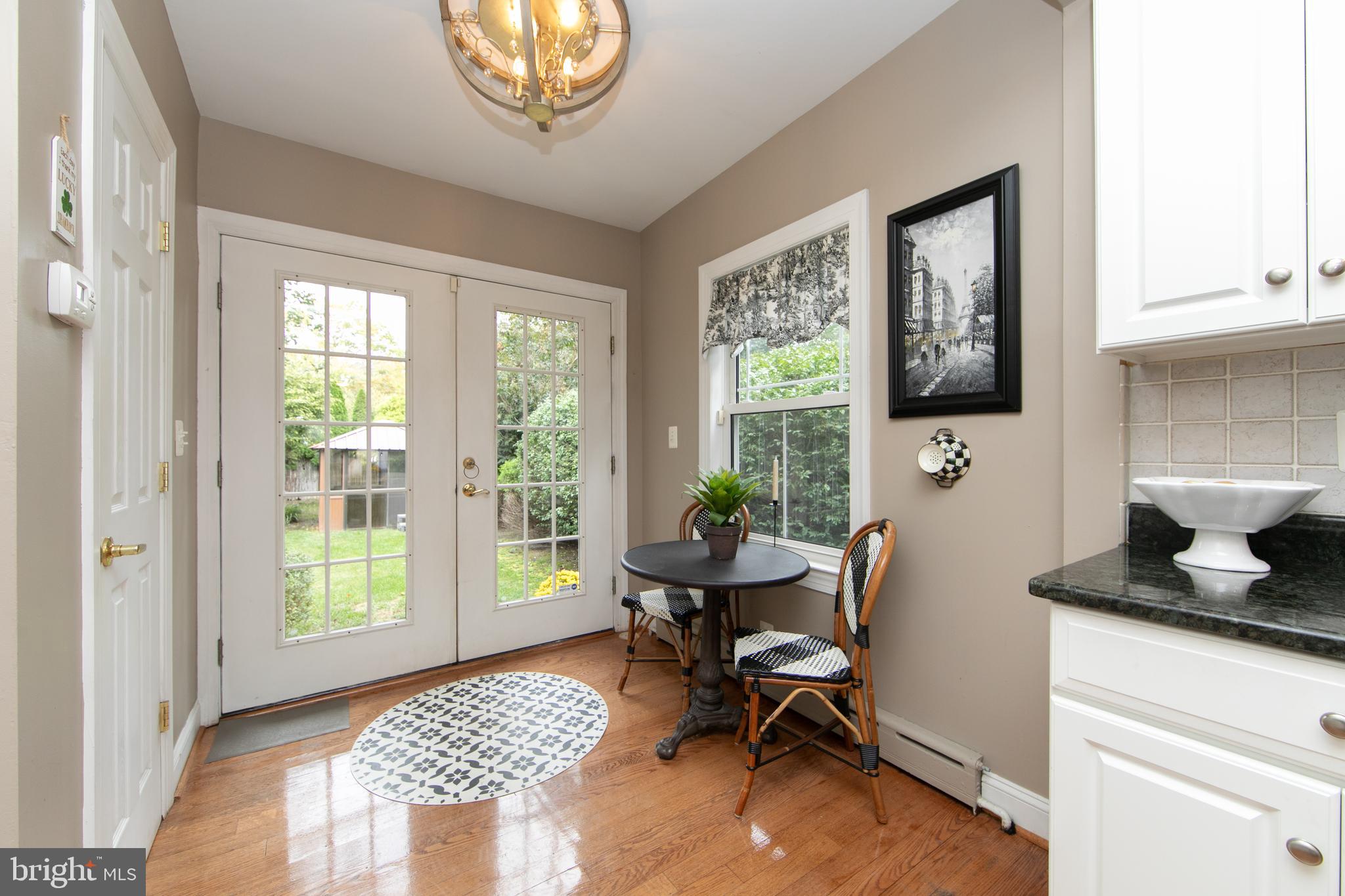 107 Centre Street Haddonfield, NJ 08033 - Photo 20 of 45 a workspace with wooden floor and a window