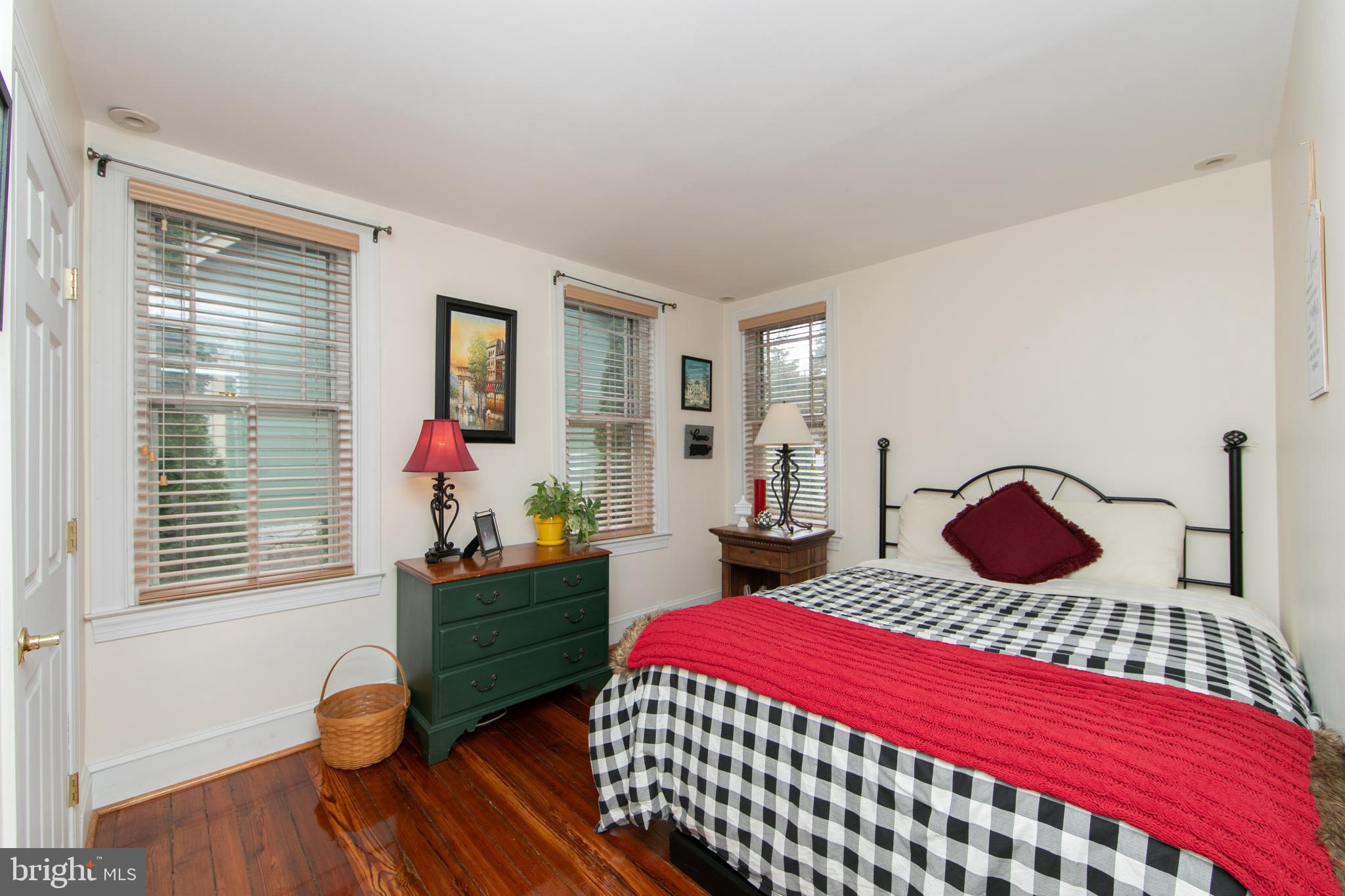 107 Centre Street Haddonfield, NJ 08033 - Photo 26 of 45 a bedroom with a bed and wooden floor