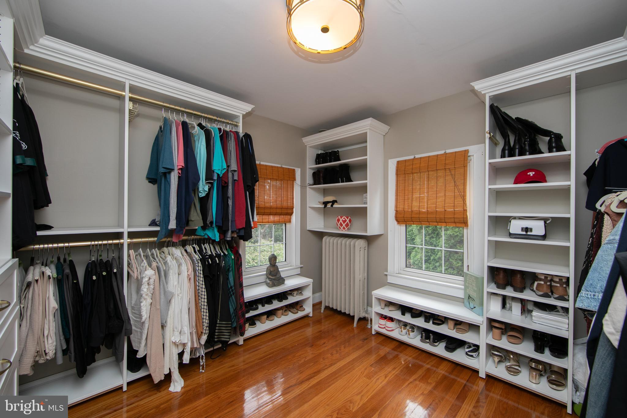 107 Centre Street Haddonfield, NJ 08033 - Photo 33 of 45 a view of walk in closet with clothes and shoes