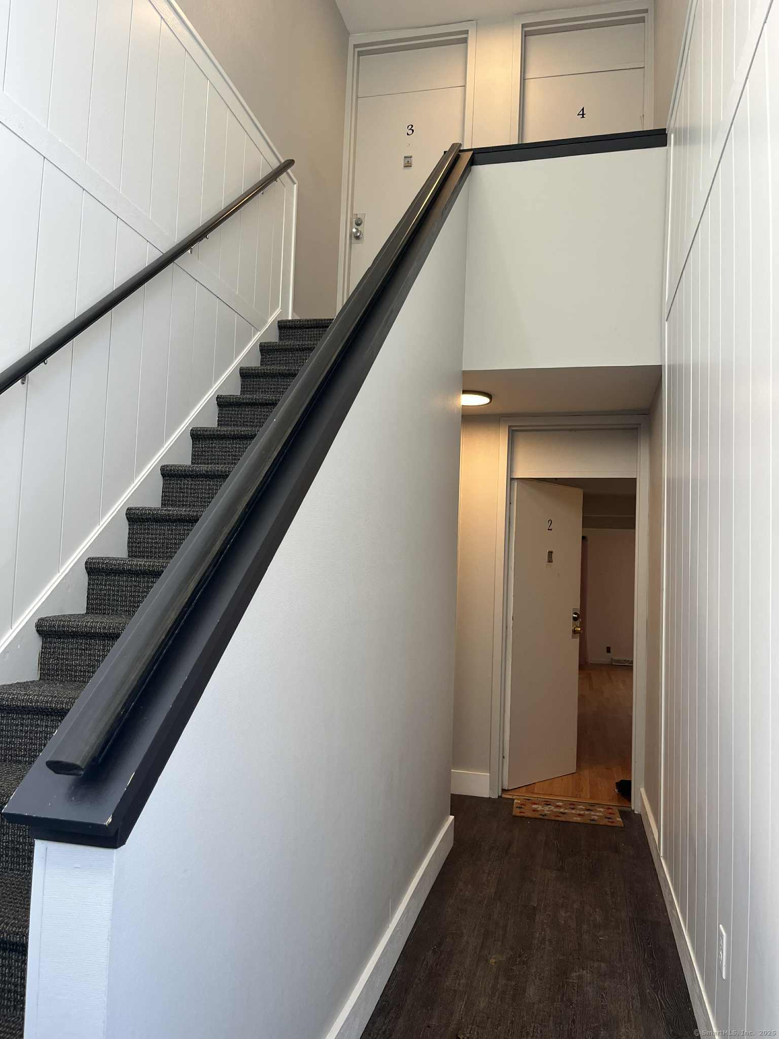 2 Cook Close, Unit 2 Ridgefield, CT 06877 - Photo 16 of 24 a view of hallway with stairs